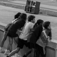 A group of children watching the players warm up on the field before the start of the World Cup Qualifier match.
Location: National Stadium
Date: October 14,2025