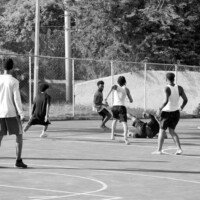 Young man falls to the ground after attempting to evade other players with the ball
Location: Behind Alfred Sangster Auditorium
Date: December 12,2025